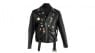 A black leather motorcycle jacket owned by Frank Zappa. A label that reads “Perfecto Schott Bros” is present. Size 46. The jacket is customized with a collection of pins. Zappa was photographed wearing the jacket with conductor Joel Thome while promoting the music of Edgard Varèse at the New York Palladium on April 16, 1981.