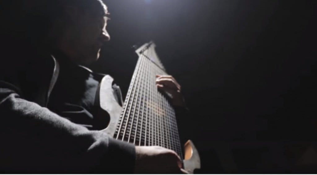 Jared Dines with his 18 String Ormsby Djent machine