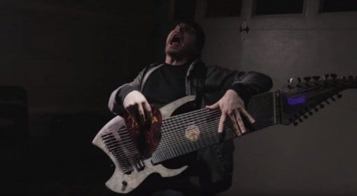 Jared Dines with his 18 String Ormsby Djent machine