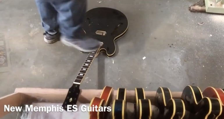 Gibson ES Guitar getting stomped on