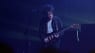 Robert Smith live in 1992 with his Fender Bass VI