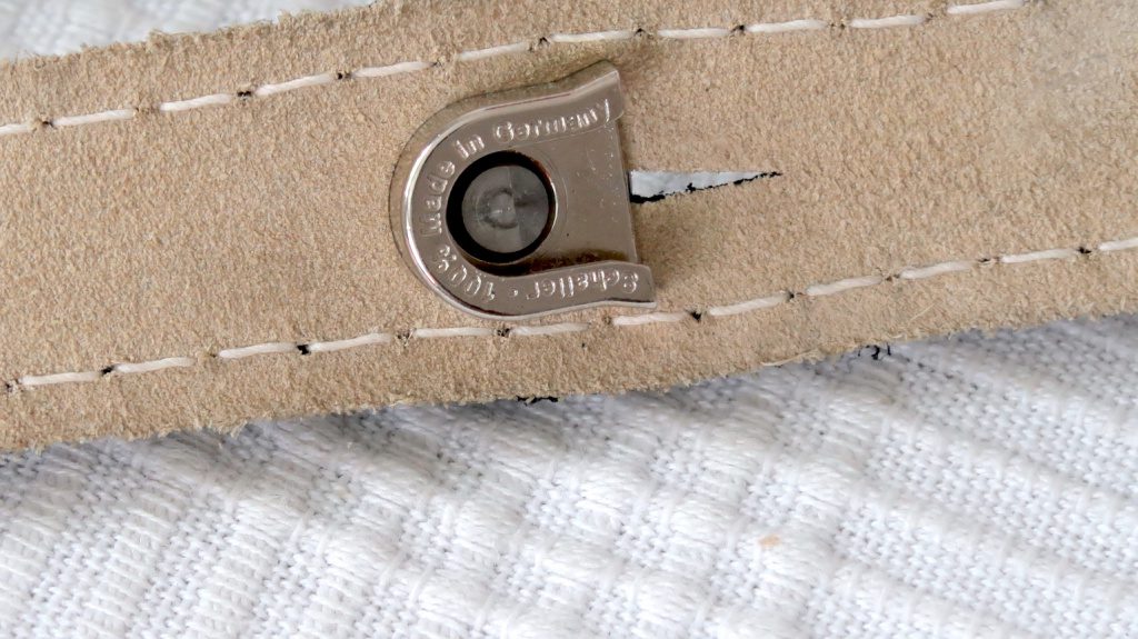The bolt locks on to the strap pin for a secure fit
