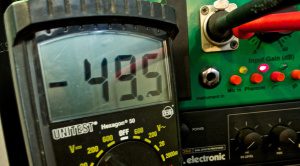 A little bit more than 48V probably isn't going to harm your mics. However, it's a great idea to measure your preamp and find out how it behaves.