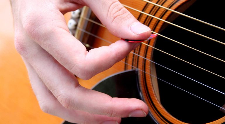 Master these 5 essential guitar strumming patterns