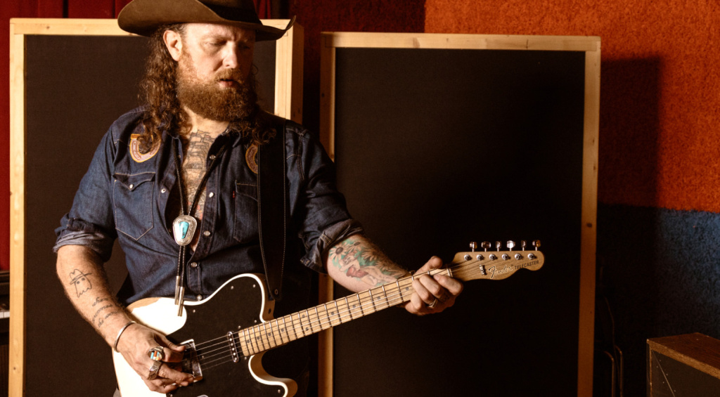John Osborne and his signature guitar
